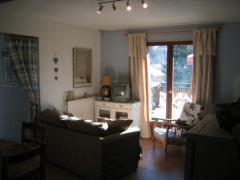 Chalet Ambroise - (fr)The living room in the gite/apartment
