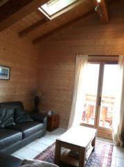 Appt. Bonamour - (fr)The first floor living room with doors to balcony