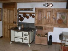 Ferme La Cherrire - (fr)The wood burning range in the living room