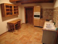 Chalet Clos du Lou - (fr)The apartment kitchen on the ground floor