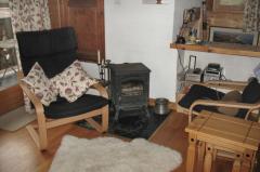 Chalet Frasserands - Le séjour et le poele