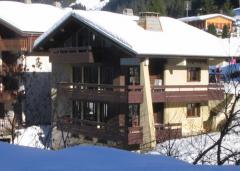 Chalet Laer - (fr)Back of the chalet, showing both apartments