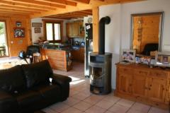 Chalet La Perriere - (fr)The open plan living room with log burner