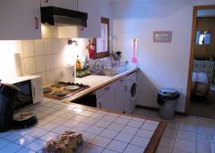 Appt. Les Crets - (fr)The kitchen (with bedroom beyond)