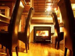 Chalet Les Pesses - (fr)The log burner in the dining room