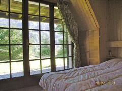 Chalet Mimi - (fr)Bedroom with doors to terrace