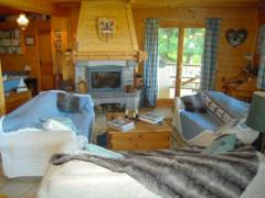Chalet Odysseus - Le séjour et la cheminée