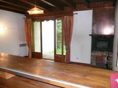 Chalet Soleret - (fr)Living room with fireplace and french windows