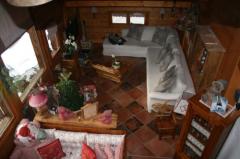 Chalet Van Houcke - (fr)The living room from the mezzanine